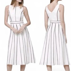 White House Black Market sleeveless seamed fit flare ponte dress. Size 8P